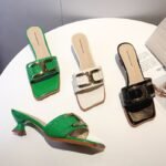 Women's export-grade metal buckle high-heeled sandals.